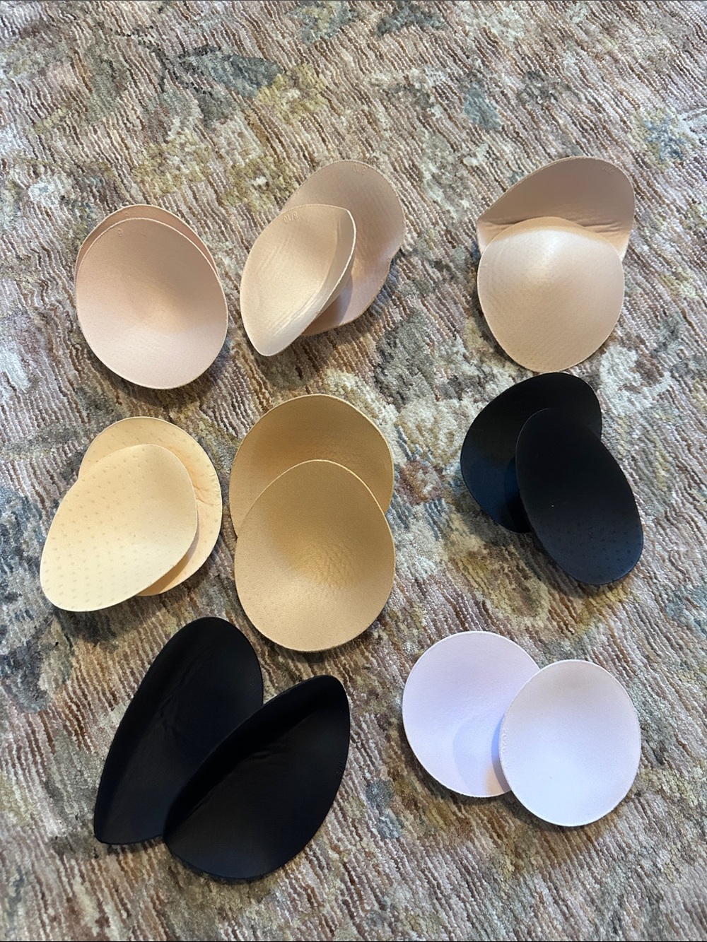 Mix of Bra Inserts and Silicone Petals in Nude, Black, and White